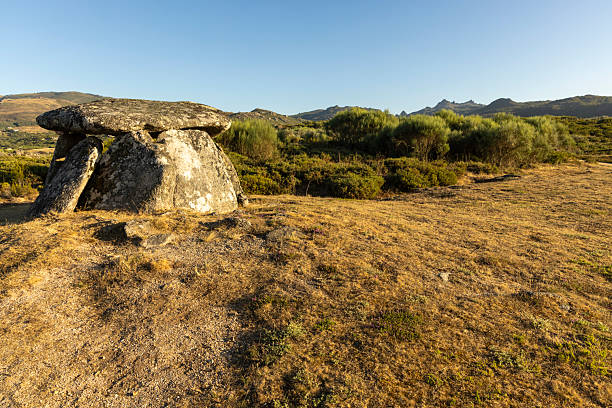 istock A rocky hillside with a small stone structure in the middle 2227227914