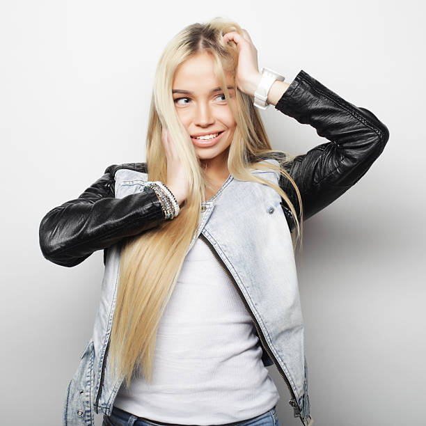 Beautiful young happy woman. Studio shot.