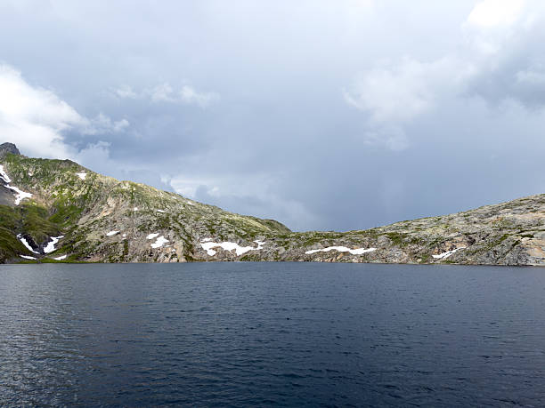 Nestled high in the heart of the Swiss Alps, this alpine lake is a breathtaking example of nature’s raw beauty and serenity. Surrounded by towering snow-capped peaks, lush green meadows, and whispering pine forests, the lake shimmers with crystal-clear turquoise waters fed by ancient glaciers.