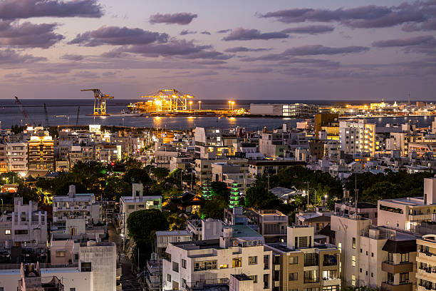 night view skyline of the capital city naha of okinawa in japan.