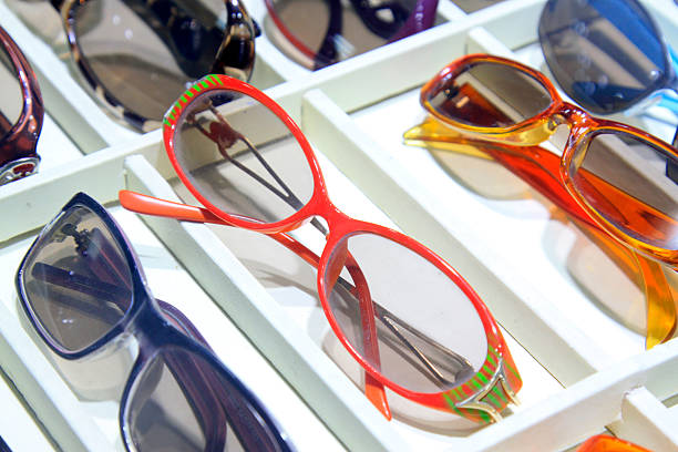 istock Color frame sunglasses on the shelf 2227235115