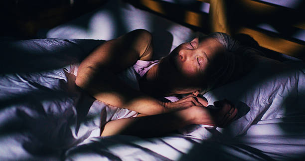 istock Senior woman sleeping 2227238520