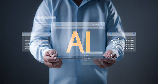 istock AI and artificial intelligence drive innovation as a businessman holds a tablet displaying data screens, representing machine learning and tech-driven digital transformation. 2227239494
