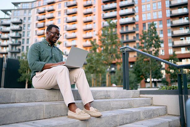 istock Young Professional Working on Laptop Outdoors 2227242254