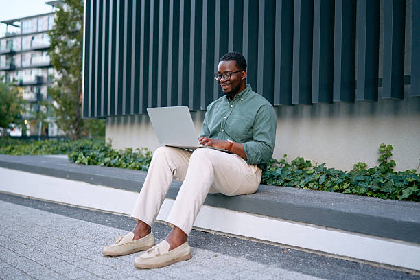 istock Young Professional Working on Laptop Outdoors 2227242390