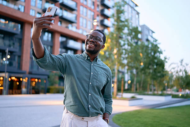 istock Businessman Taking a Selfie in Urban Setting 2227242455