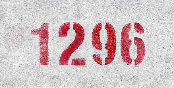 istock Red Number 1296 on the white wall. Spray paint. 2227246160