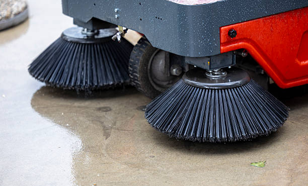 istock Cleaning equipment sweeping pavement during maintenance activity 2227248828