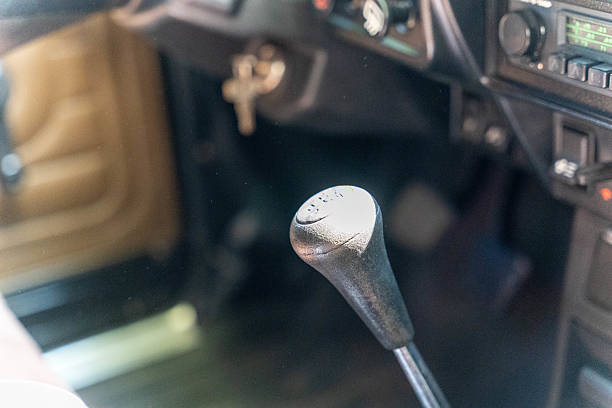 istock Gear stick showing four speed plus reverse in vintage car interior 2227251695