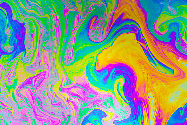 istock Psychedelic multicolored background abstract. Rainbow colors. patterns background. Photo macro shot of soap bubbles 2227258950