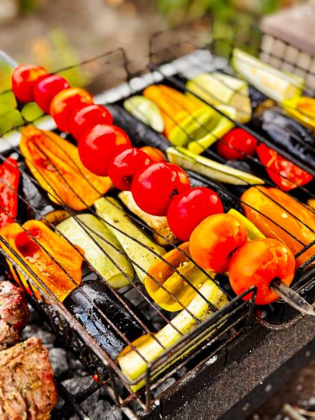 istock barbecue grilled meat and vegetables 2227260584