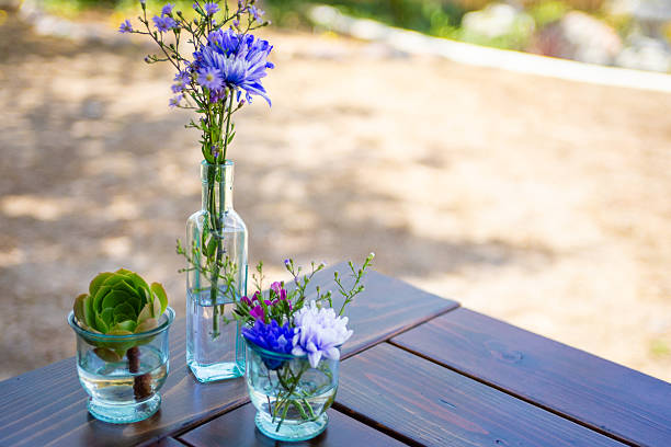 Simple Floral Center Pieces on a table out side