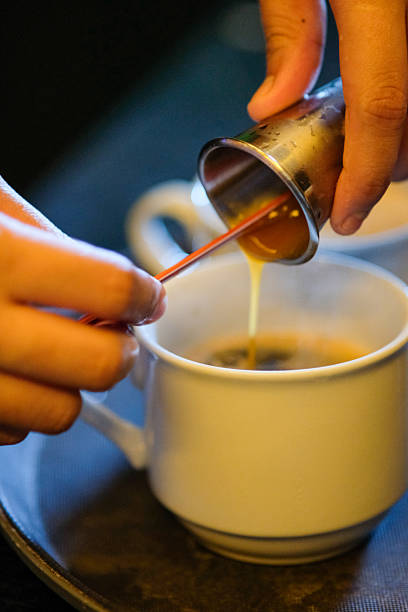 istock Caramel sauce being poured for coffee preparation . 2227261068