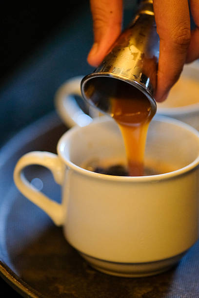 istock Caramel sauce being poured for coffee preparation . 2227261072