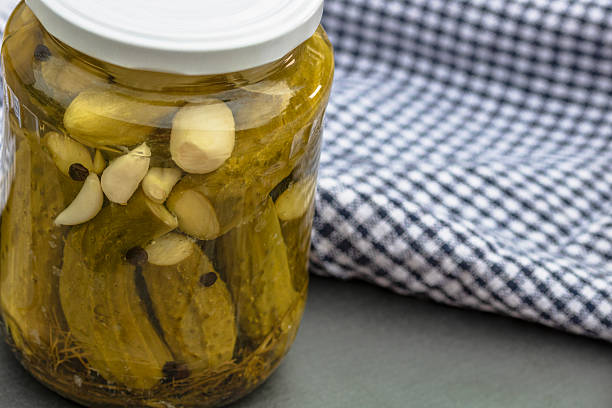 istock Canned cucumber in vinegar. Pickled cucumber 2227263087