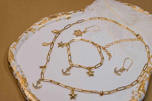 istock Beautiful handmade necklace and braclet on background 2227266018