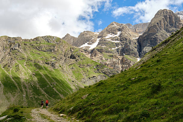 istock Mountaineers approaching mountains for climbing 2227272019