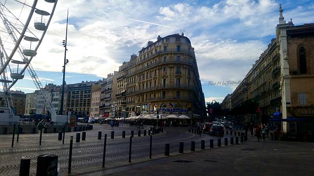 Ferris Wheel and Historic Architecture in Marseille