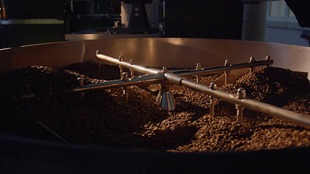 istock Coffee beans cooling down in roasting machine, industrial production 2227285965