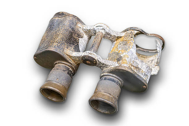 Rusty binocular against pure white background
