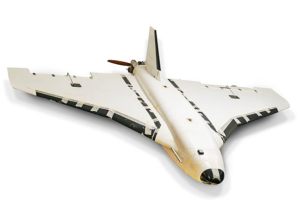 istock Model Russian drone on white surface, resembling snow Gray, white, black, and orange color scheme Realistic style with control surfaces detailing Artificial lighting without harsh shadows No peop 2227290929