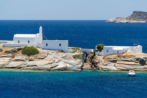 Aegean blue waters surround the  Chrisopigi Monastery Sifnos Greece