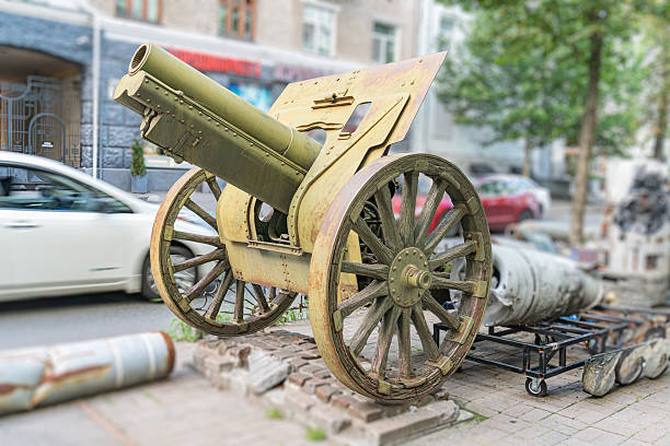 istock An aged cannon on a brick pavement in an urban setting, with modern architecture visible in the background The cannon is rusty and appears to be a historical artifact or monument No people are pres 2227293575