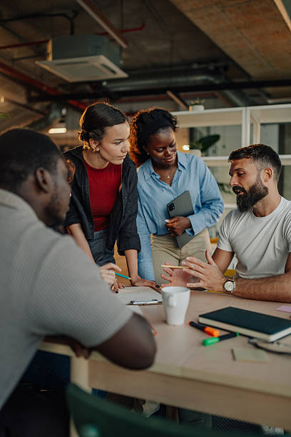 istock Diverse business team collaborating on project in modern office 2227295492