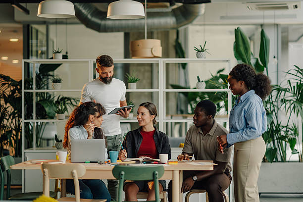 istock Diverse business team collaborating on project in modern office 2227295615