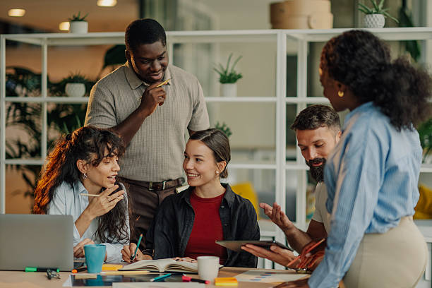 istock Diverse business team collaborating on project in modern office 2227295618