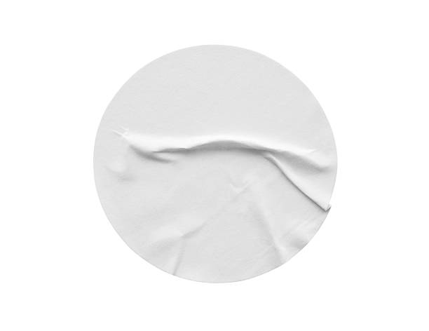 istock Blank white round paper sticker label isolated on white background 2227297337