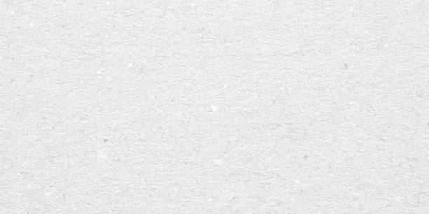 istock White recycle craft paper cardboard surface texture background 2227297564