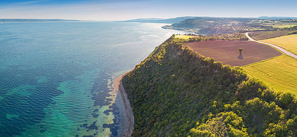 istock Stunning panoramic view of dramatic cliffs, turquoise waters, and surrounding landscape 2227297757