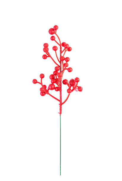 istock Artificial red berry branch with a metallic stem, ideal for Christmas gift wrapping, handmade crafts, and festive decorations 2227301501