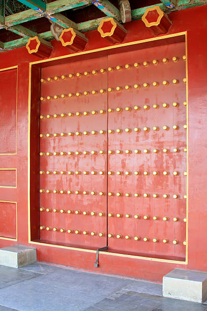 istock Chinese ancient wooden palace gate 2227305559