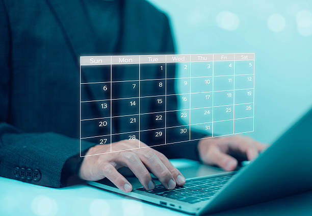 istock Business people use work schedules in business as a technological plan and project for proper planning and knowing the timeline of the work progress. 2227310138