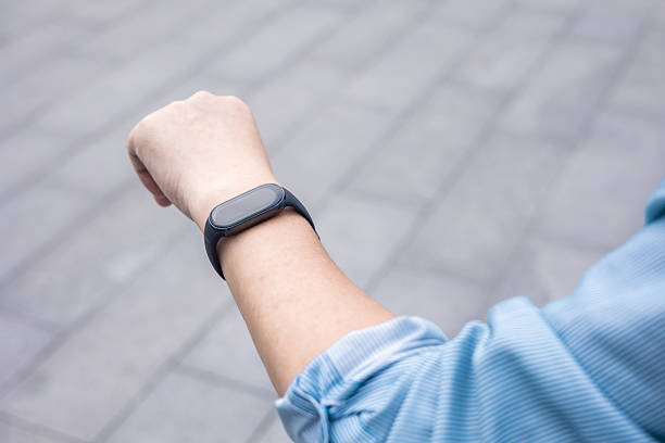 istock An arm with a digital watch 2227310643