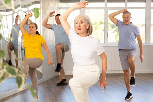 istock Elderly woman dances modern dances in group 2227316998