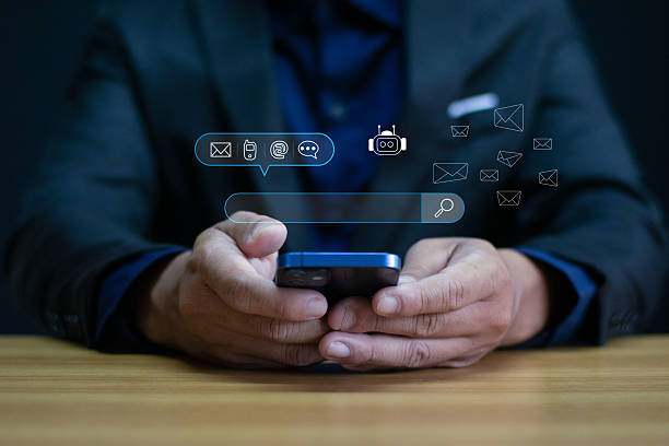 istock AI chatbot, a businessman using a smartphone, is a symbol of intelligent customer support, automated communication, and artificial intelligence in mobile digital service platforms. 2227317327