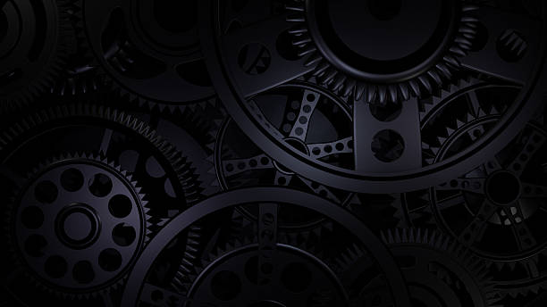istock Sleek Black Steel Gears Interlocked in Precision 2227323755