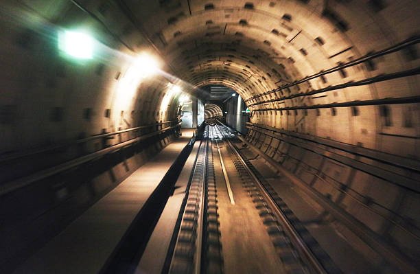 istock Long exposure captures the dramatic motion of a metro train moving through a tunnel. Bright lights and blurred lines create a sense of speed and depth in the underground transit system. 2227325162