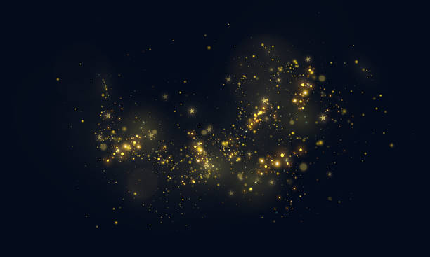 istock Shimmering gold particles and twinkling stars form a light cloud on a transparent dark background. 2227328131