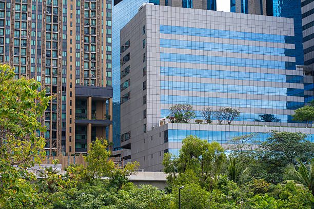 istock Green city park with modern office building 2227328306