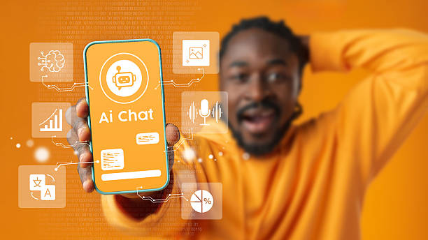 istock Person shows smartphone displaying AI chat application on bright orange background while expressing excitement and engagement 2227330385