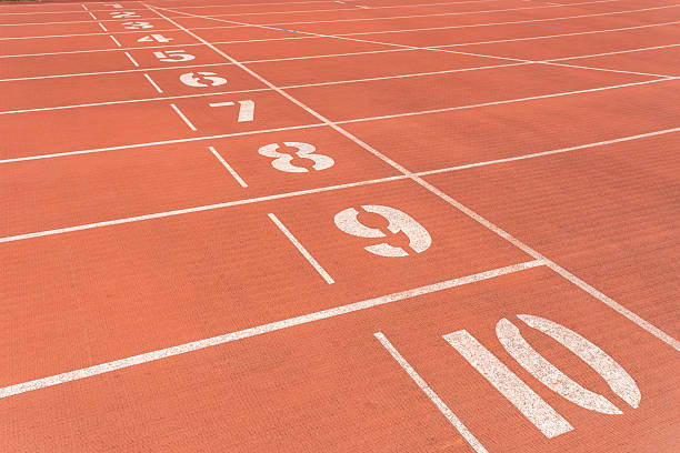 istock Red rubber synthetic track on the stadium 2227330687