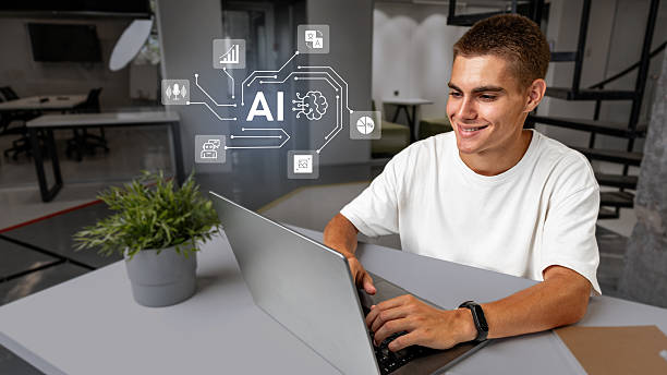 istock Young man engaged in AI research while working on a laptop in a modern office environment during daytime 2227330839