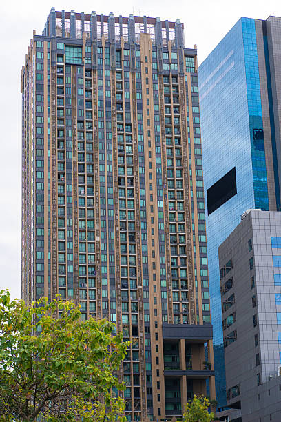 istock Green city park with modern office building 2227330904