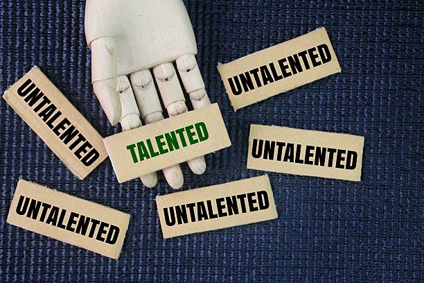 istock Two words talented and untalented. chosen talented. contrasting terms describing a person's aptitude or skill in a particular area. 2227331429