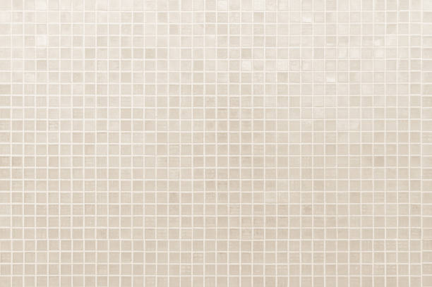 istock Cream light ceramic wall and floor tiles mosaic background. Simple seamless abstract surface clean. 2227332163