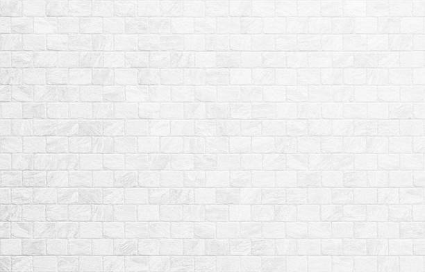 istock Close up modern white brick tiles wall texture background. 2227332167